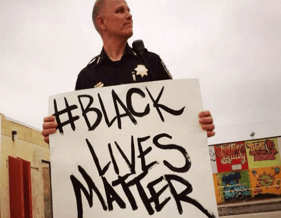 Editorial: White Police Chief Holds Up #BlackLivesMatter Protest Sign, Police Union Starts Trippin